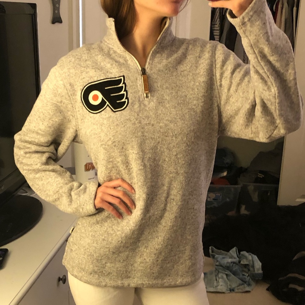 Woman’s Flyers quarter zip sweater